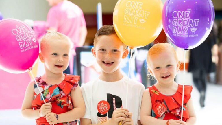 Kids enjoy ‘One Great Day’ to start the summer at The Mall - cropped L to R Tobias Daisy and Matilda Barton enjoying One Great Day scaled 1