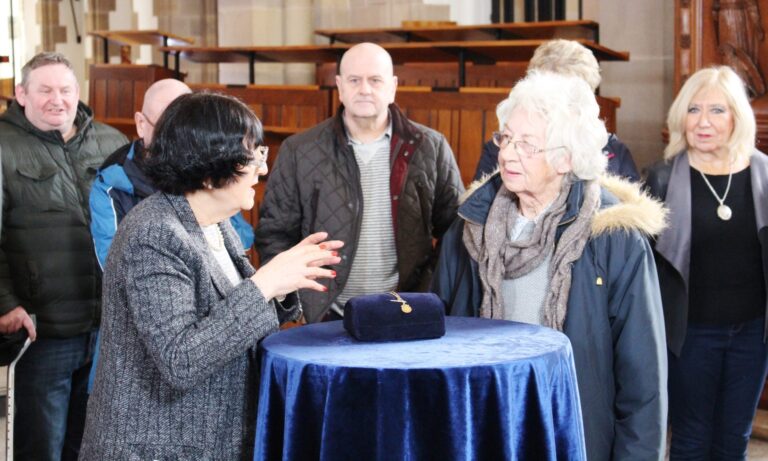 BBC TV's Flog It at Blackburn Cathedral - Broadcast Today - Antiques expert Anita Manning left conducts a valuation at the Cathedral as some of the 600 people who attended on the day look on scaled 1 scaled