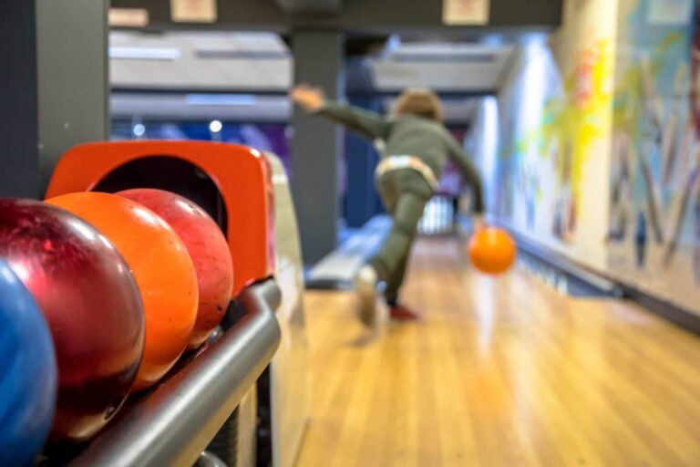 Which Businesses will not be allowed to reopen in Blackburn and Darwen this weekend - child throwing bowling ball 8ZC6GPH scaled e1596097220158