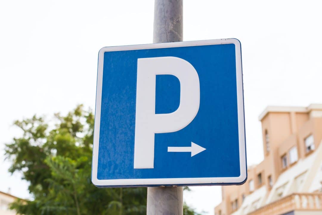 Parking sign showing free places. Sign on a pole