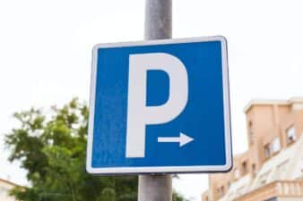 Parking sign showing free places. Sign on a pole