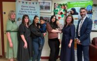 Visitors, staff and parents at Little Harwood Family Hub with Dame Rachel De Souza