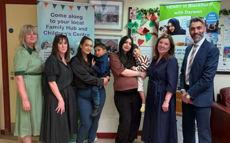 Visitors, staff and parents at Little Harwood Family Hub with Dame Rachel De Souza