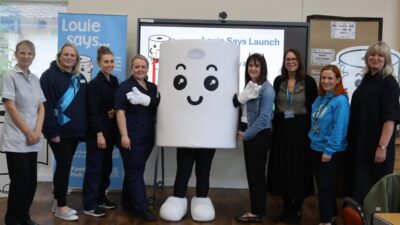 Group of people at the Louie Says toilet training launch event in Blackburn with Darwen