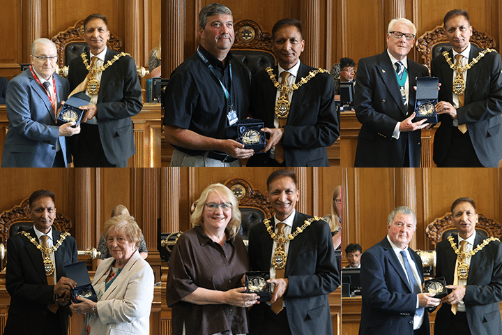 A collage image of six individuals receiving an award from a Borough mayor in a council chamber.