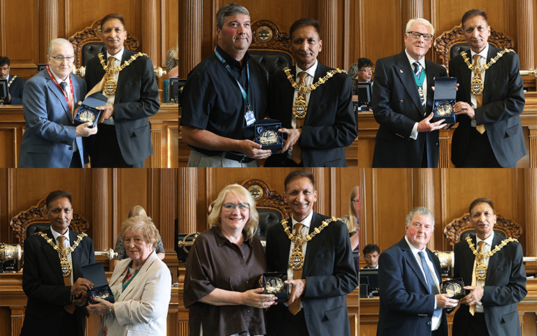 A collage image of six individuals receiving an award from a Borough mayor in a council chamber.