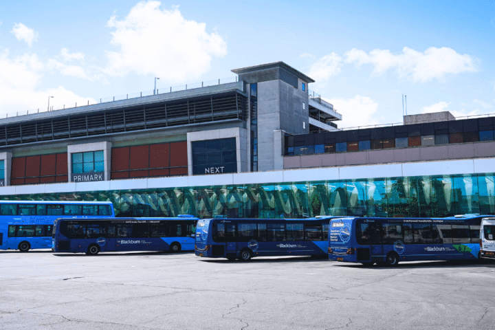 Blackburn bus station with buses lined up outside.