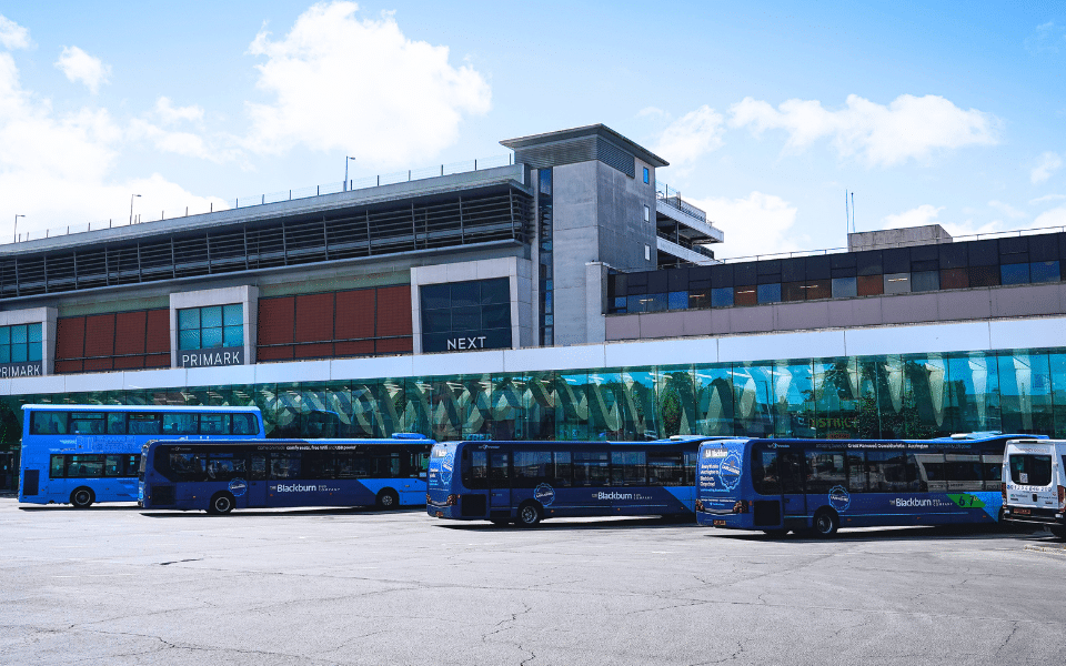 Blackburn bus station with buses lined up outside.