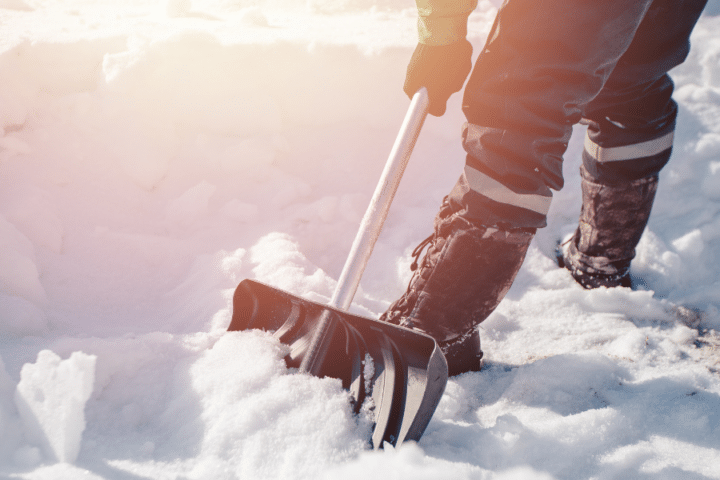 A person shovelling snow.