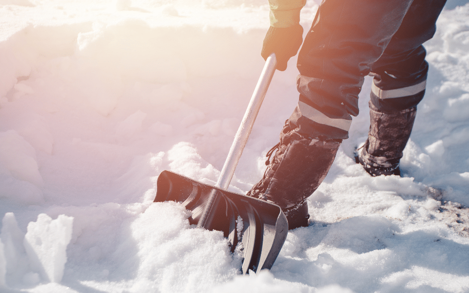 A person shovelling snow.
